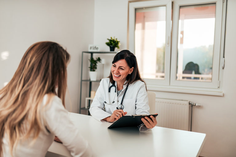 Doctor talking to clinical trial participant